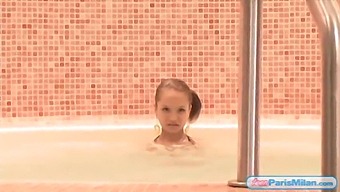 Teen Paris Milan In A Bikini Seductively Poses In A Jacuzzi